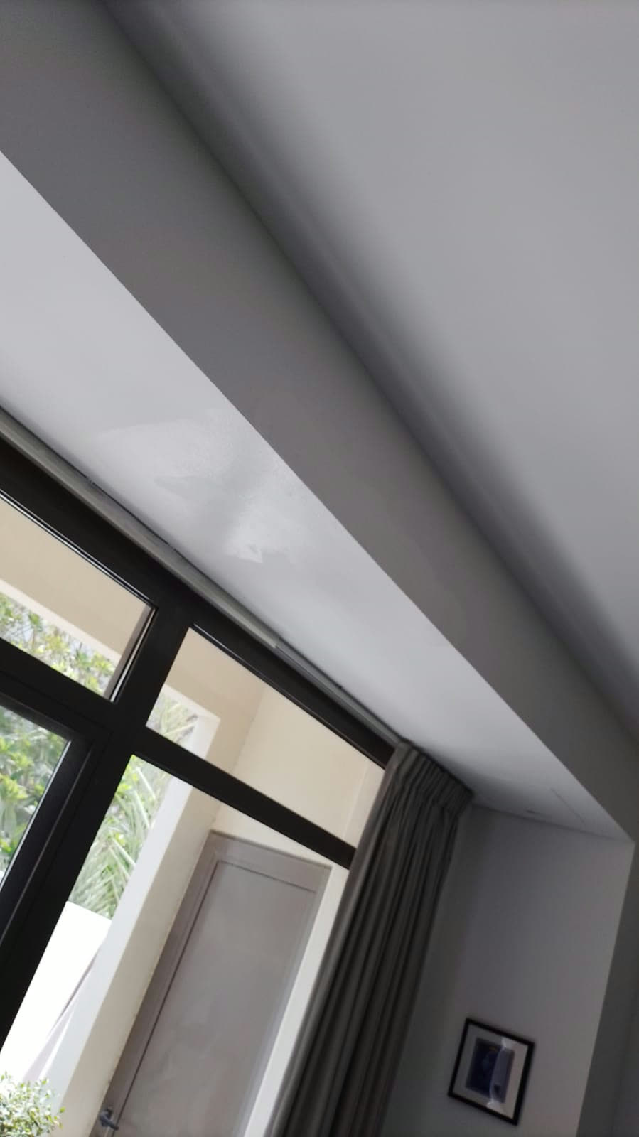 Painting after: Leak traced, ceiling made good and repainted.
