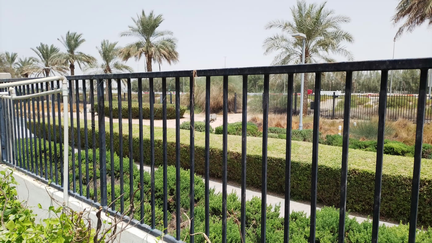 Civil before: Open garden fence, no privacy.